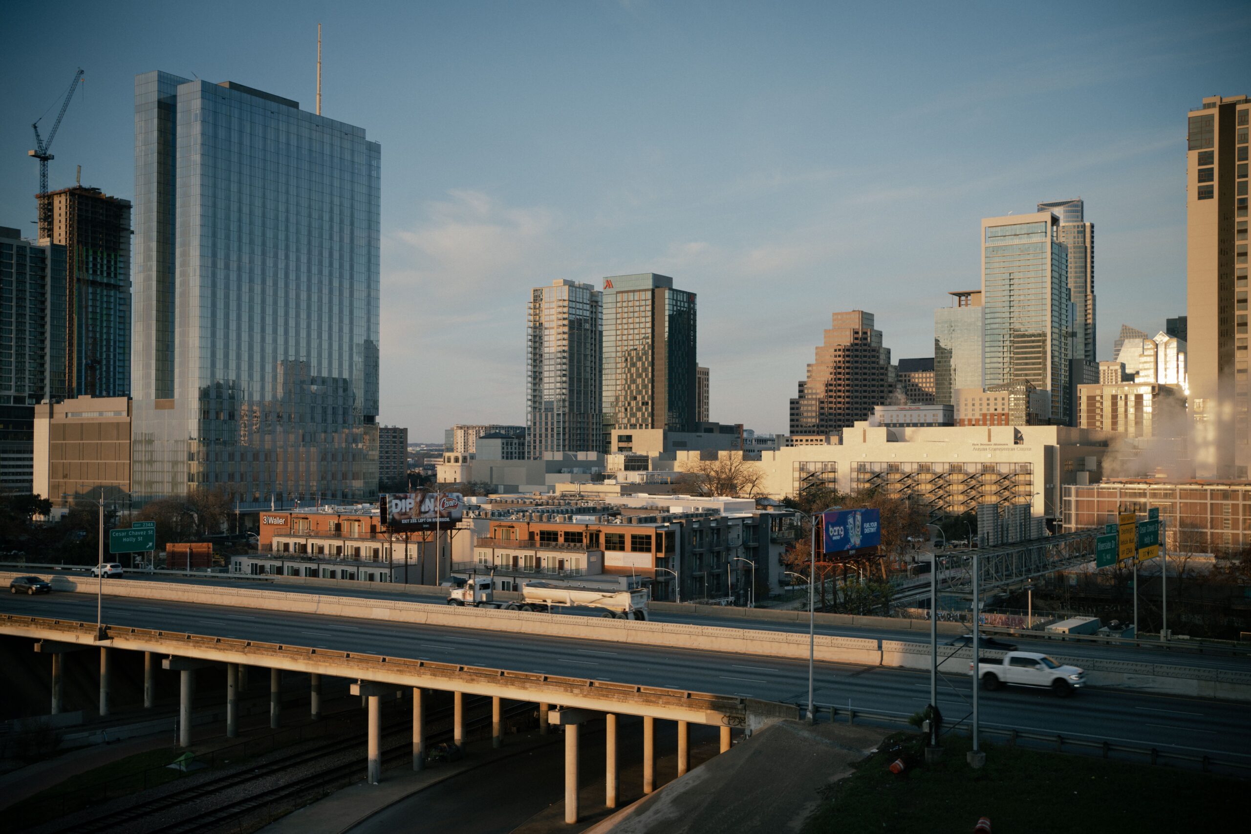 Austin skyline and a laptop representing modern Texas businesses
